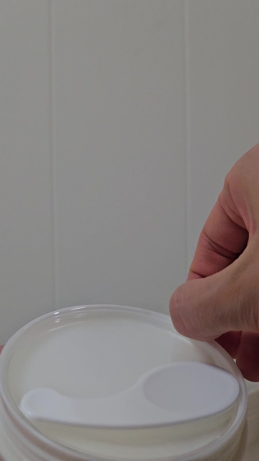 Beauty of Joseon cleansing balm opened, showing the smooth white balm surface and included spatula