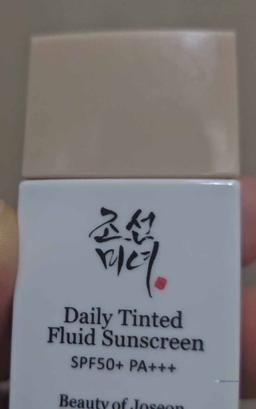 Front of the Beauty of Joseon Daily Tinted Fluid Sunscreen bottle showing SPF50+ PA+++ in English and the brand name in Korean calligraphy
