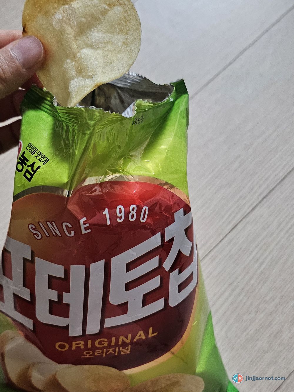 Home Run Ball chocolate cream puff snacks stacked on a Korean supermarket shelf