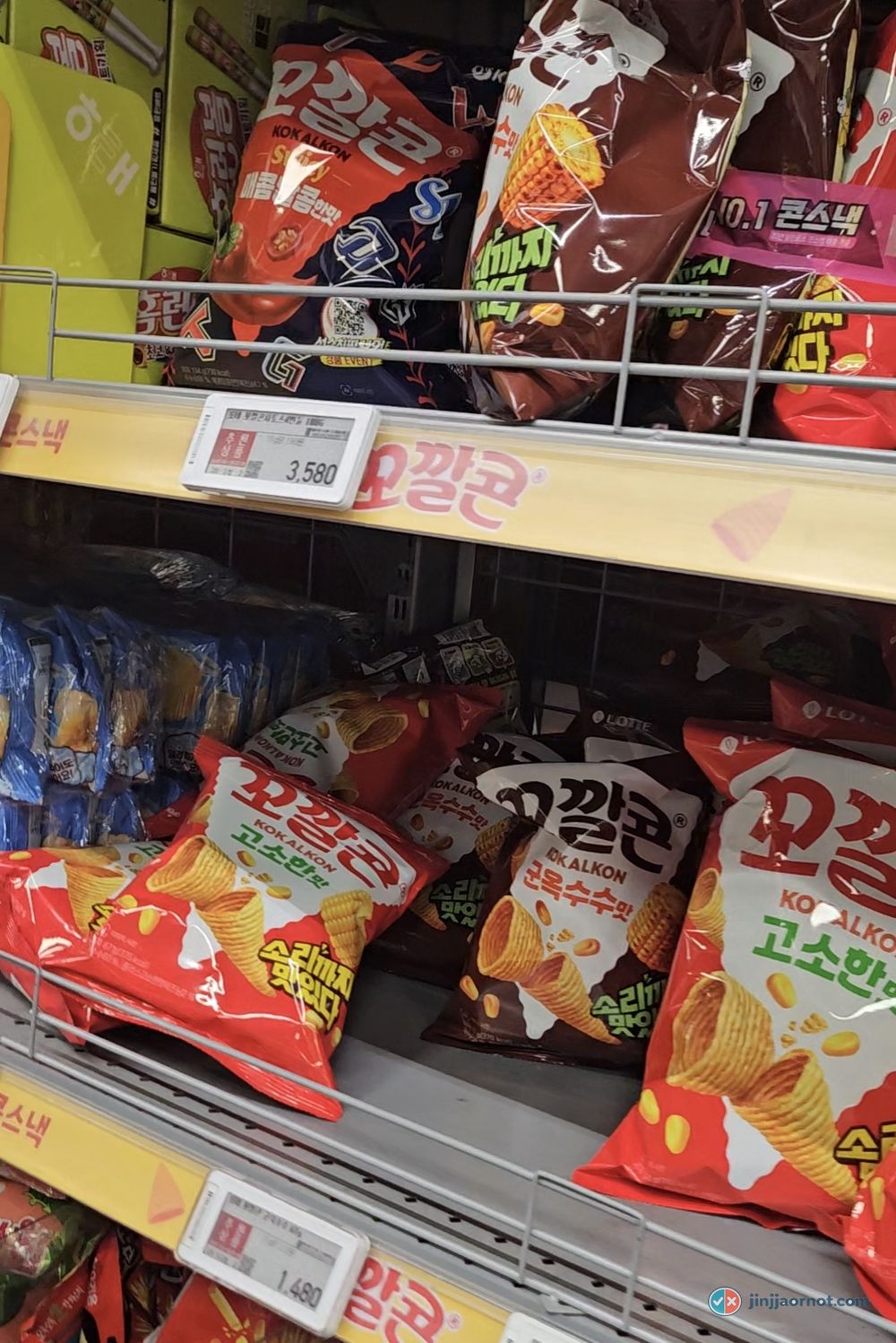 Kokal Kon corn snack bags on a Korean supermarket shelf in several flavors