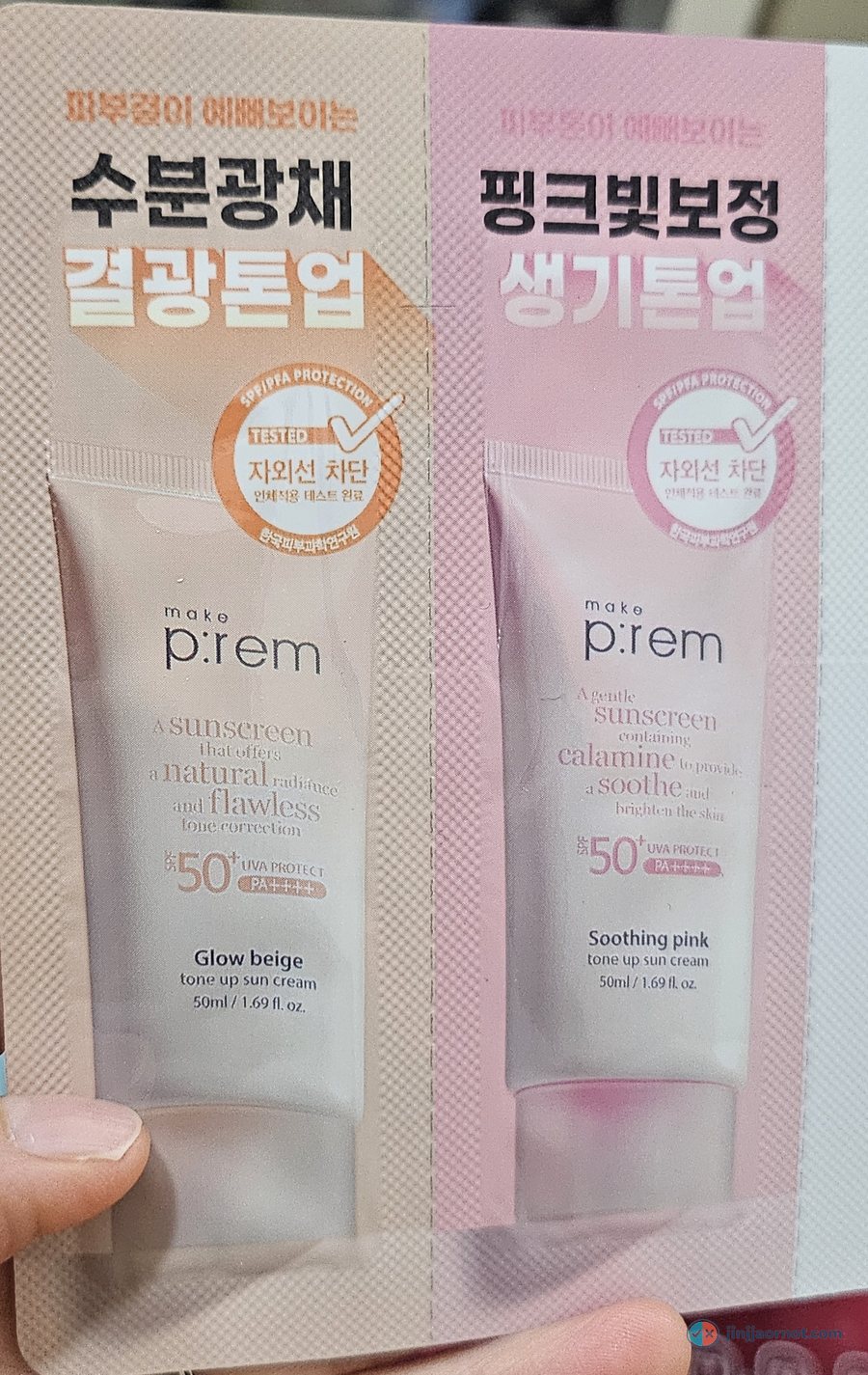 Two make p:rem tone up sun cream sample sachets held in hand, Glow Beige and Soothing Pink