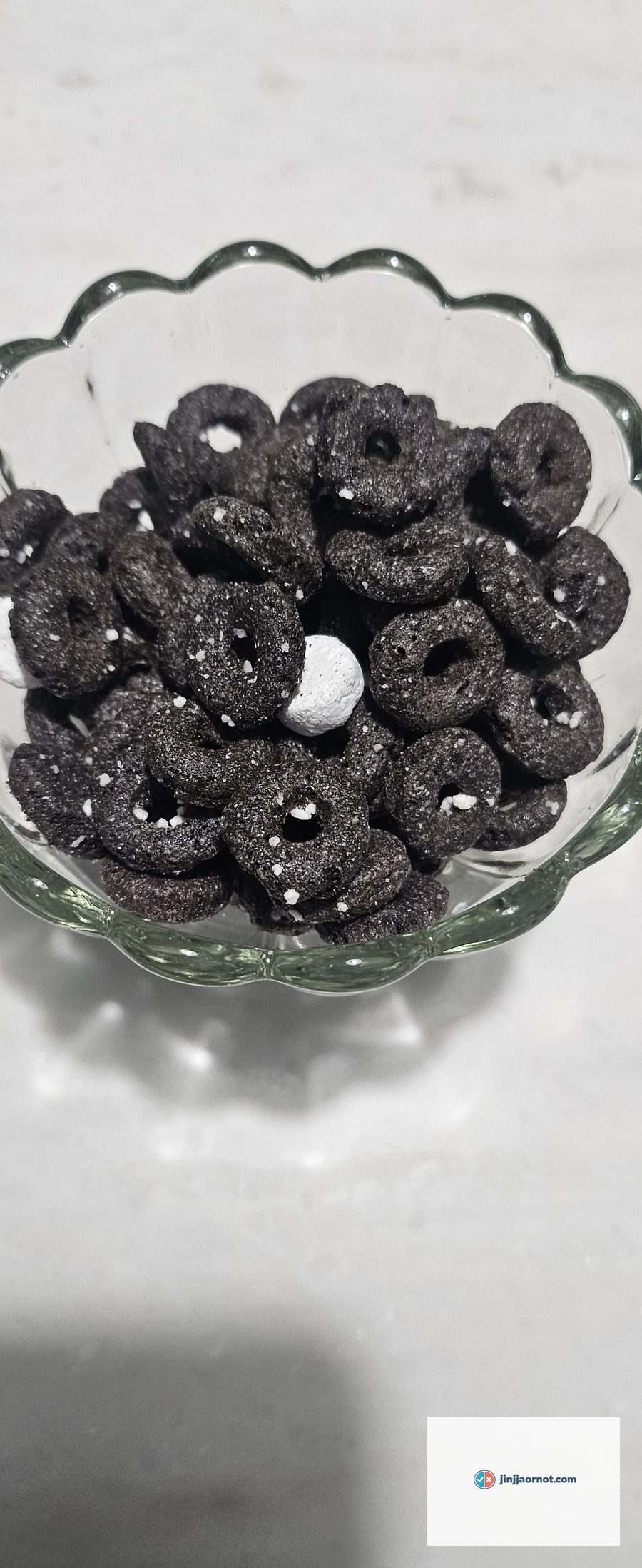Korean Oreo O's cereal rings in a glass bowl, no milk