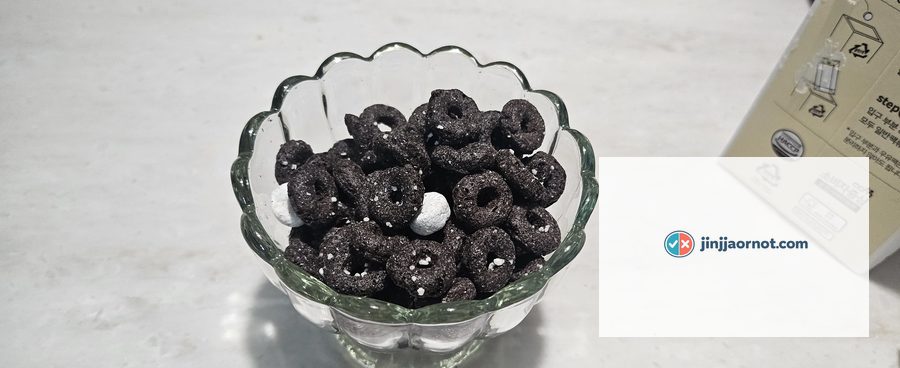 Korean Oreo O's cereal in a glass bowl with milk poured over