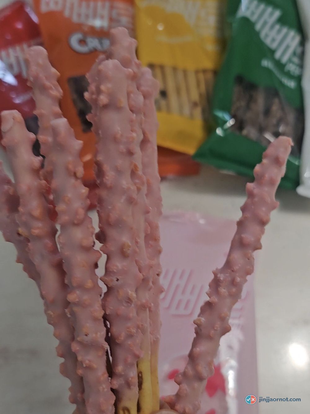 Original Pepero sticks close up, plain chocolate coating on a thin biscuit