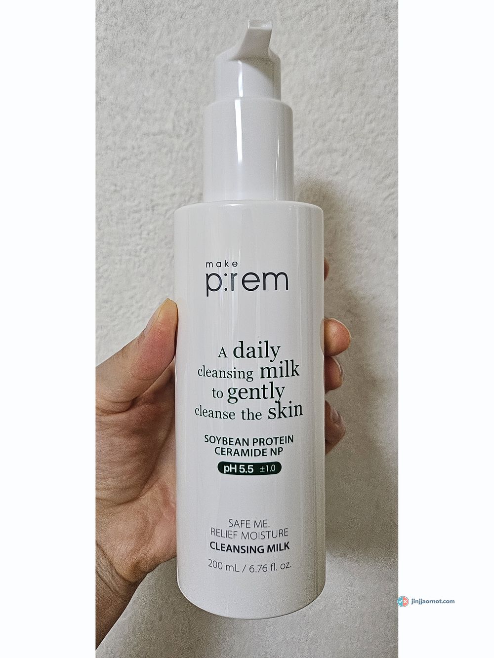 Korean cleansing milk pumped onto the back of a hand