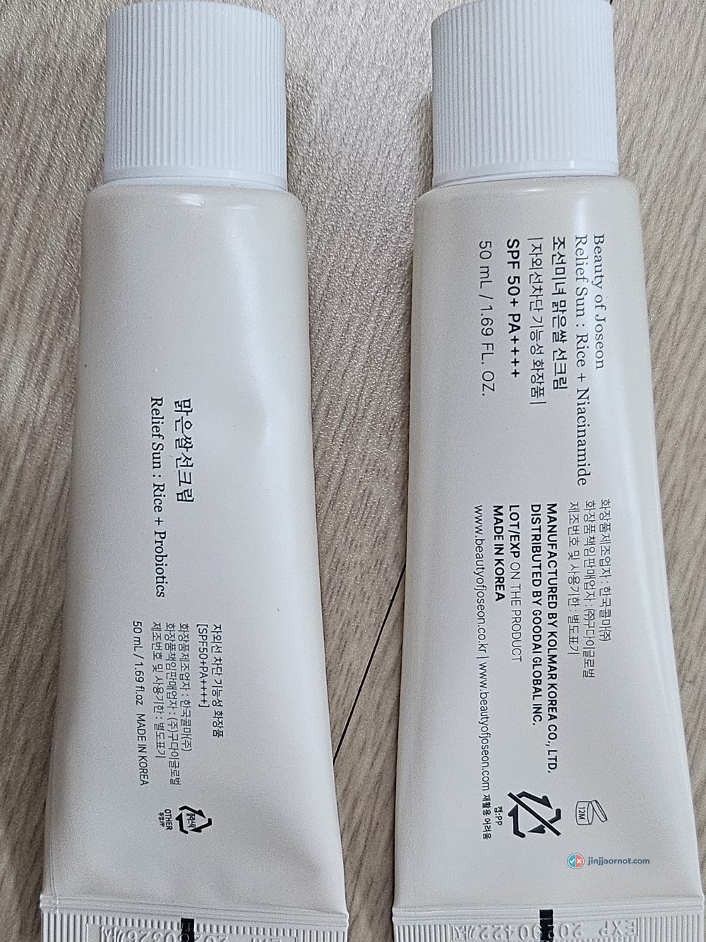 Backs of both Relief Sun tubes showing 50ml, SPF 50+ PA++++ and Made in Korea