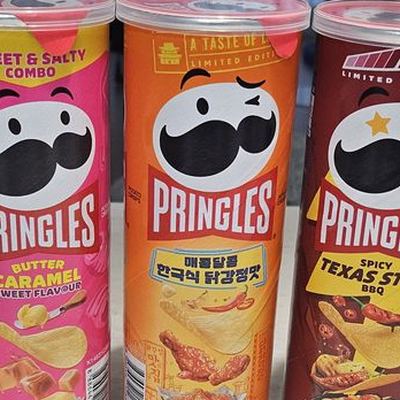 Three Korean Pringles cans: butter caramel, dakgangjeong and Texas BBQ